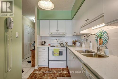 707 - 744 Wonderland Road S, London, ON - Indoor Photo Showing Kitchen With Double Sink