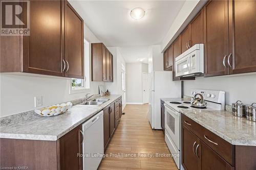 752 Newmarket Lane, Kingston (East Of Sir John A. Blvd), ON - Indoor Photo Showing Kitchen With Double Sink