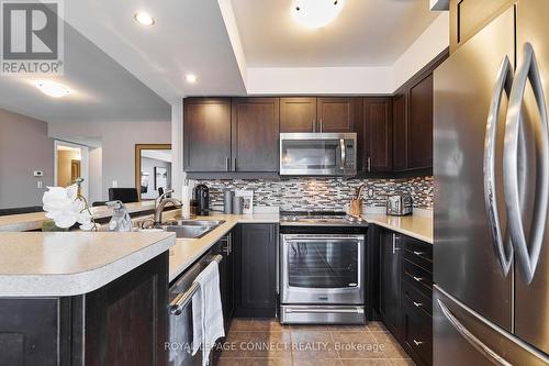 301 - 1725 Pure Springs Boulevard N, Pickering, ON - Indoor Photo Showing Kitchen With Stainless Steel Kitchen With Double Sink With Upgraded Kitchen