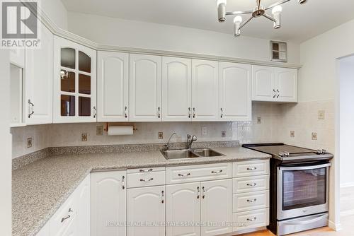 803 - 80 Quebec Avenue, Toronto, ON - Indoor Photo Showing Kitchen With Double Sink