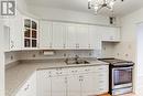 803 - 80 Quebec Avenue, Toronto, ON  - Indoor Photo Showing Kitchen With Double Sink 