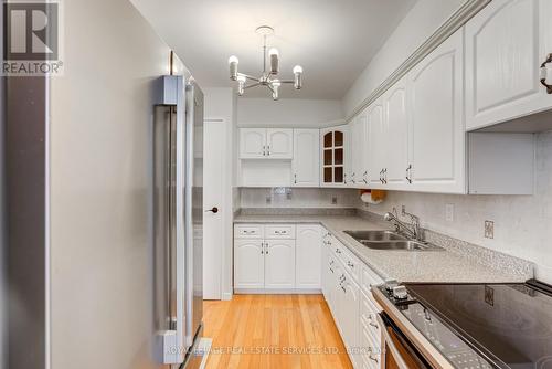 803 - 80 Quebec Avenue, Toronto, ON - Indoor Photo Showing Kitchen With Double Sink