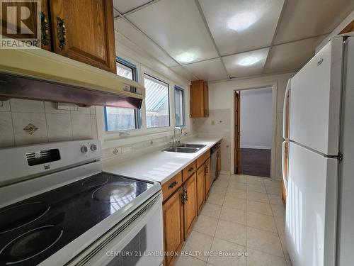 5 Shilton Road, Toronto, ON - Indoor Photo Showing Kitchen With Double Sink