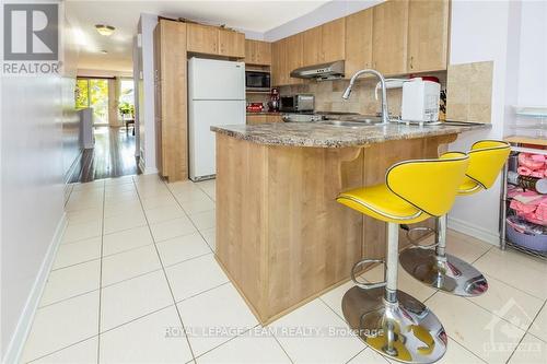 A - 566 Chapman Mills Drive, Ottawa, ON - Indoor Photo Showing Kitchen With Double Sink