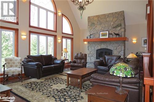 1130 Parsons Road, Dysart Et Al, ON - Indoor Photo Showing Living Room With Fireplace