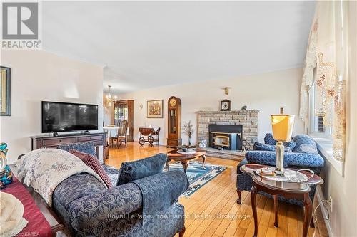 240 Somerset Drive, Loyalist (Bath), ON - Indoor Photo Showing Living Room With Fireplace