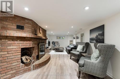 4047 Old Dundas Street, Toronto, ON - Indoor Photo Showing Living Room With Fireplace