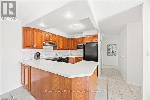 208 - 120 Barrett Court, Kingston (Kingston East (Incl Barret Crt)), ON - Indoor Photo Showing Kitchen