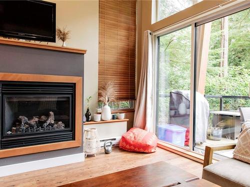 12-203 Boardwalk Blvd, Ucluelet, BC - Indoor Photo Showing Living Room With Fireplace