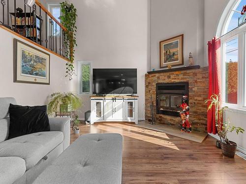 Salon - 1104 Rue Du Phénix, Lévis (Les Chutes-De-La-Chaudière-Est), QC - Indoor Photo Showing Living Room With Fireplace