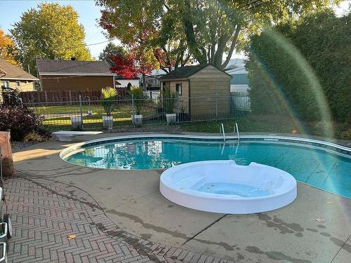 Spa - 1279 Rue De Nice, Québec (Charlesbourg), QC - Outdoor With In Ground Pool With Backyard