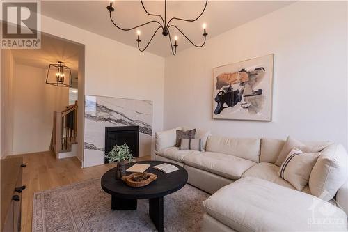 183 Craig Duncan Terrace, Ottawa, ON - Indoor Photo Showing Living Room With Fireplace