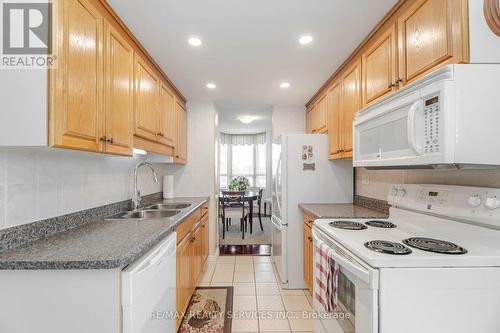 508 - 100 County Court Boulevard, Brampton, ON - Indoor Photo Showing Kitchen With Double Sink