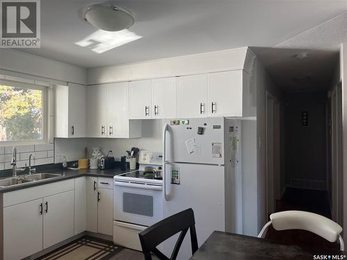 68 Borlase Crescent, Regina, SK - Indoor Photo Showing Kitchen With Double Sink