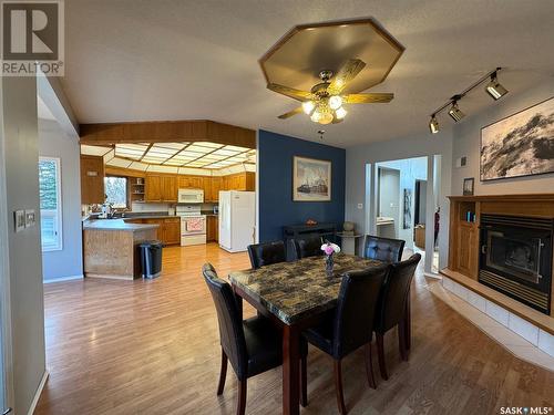 Rae'S N Sons Acreage, Orkney Rm No. 244, SK - Indoor Photo Showing Dining Room With Fireplace