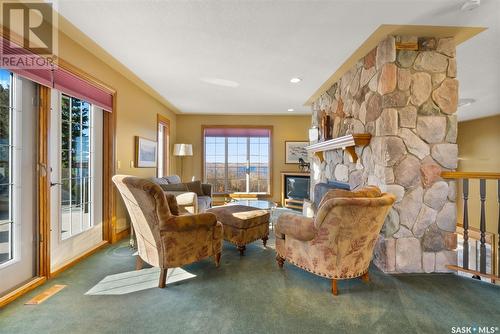 612 Green Avenue, Regina Beach, SK - Indoor Photo Showing Other Room With Fireplace