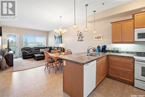 204 102 Armistice Way, Saskatoon, SK - Indoor Photo Showing Kitchen With Double Sink