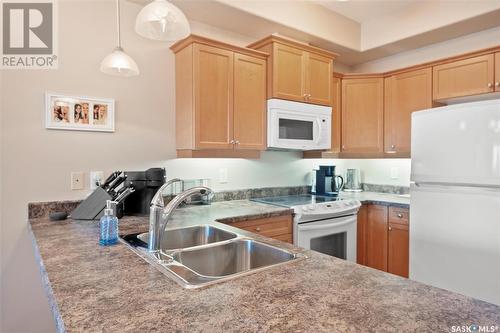 204 102 Armistice Way, Saskatoon, SK - Indoor Photo Showing Kitchen With Double Sink