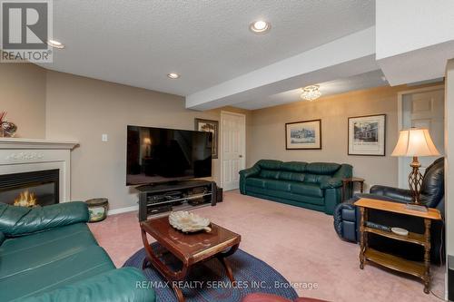 52 Buffridge Trail, Brampton, ON - Indoor Photo Showing Living Room With Fireplace