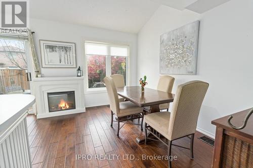 102 James Young Drive, Halton Hills, ON - Indoor Photo Showing Dining Room With Fireplace