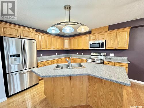 102 586 River Street E, Prince Albert, SK - Indoor Photo Showing Kitchen With Stainless Steel Kitchen With Double Sink