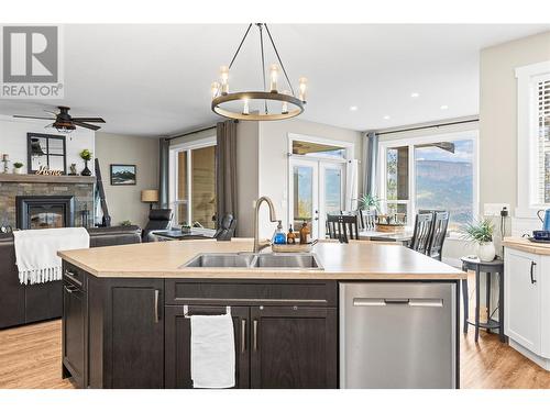 260 Terry Road, Enderby, BC - Indoor Photo Showing Kitchen With Fireplace With Double Sink