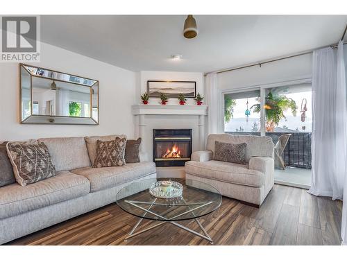 2669 Wild Horse Drive, West Kelowna, BC - Indoor Photo Showing Living Room With Fireplace