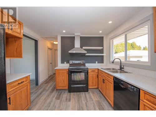 3211 16Th Street, Vernon, BC - Indoor Photo Showing Kitchen With Double Sink