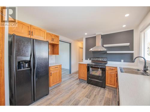 3211 16Th Street, Vernon, BC - Indoor Photo Showing Kitchen With Double Sink