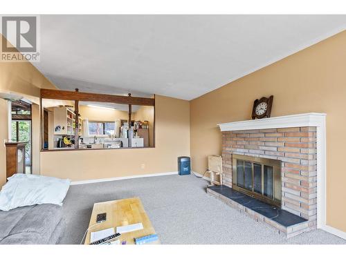 605 Dell Road, Kelowna, BC - Indoor Photo Showing Living Room With Fireplace