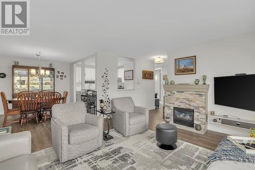 645 Barrera Road Unit# 204, Kelowna, BC - Indoor Photo Showing Living Room With Fireplace