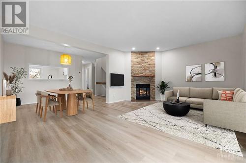 292 Dalehurst Drive Unit#E, Ottawa, ON - Indoor Photo Showing Living Room With Fireplace