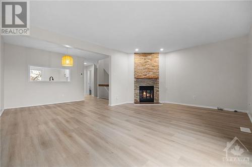 292 Dalehurst Drive Unit#E, Ottawa, ON - Indoor Photo Showing Living Room With Fireplace