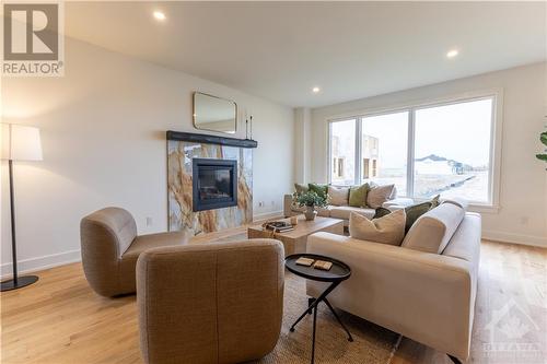 711 Ploughman Place, Ottawa, ON - Indoor Photo Showing Living Room With Fireplace