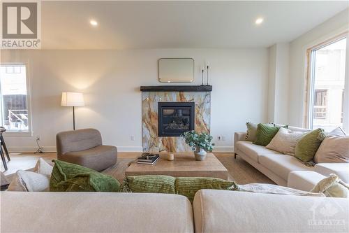 711 Ploughman Place, Ottawa, ON - Indoor Photo Showing Living Room With Fireplace