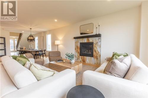 711 Ploughman Place, Ottawa, ON - Indoor Photo Showing Living Room With Fireplace