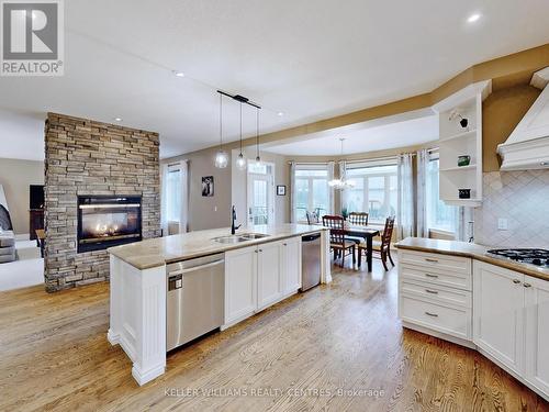 387129 20 Sideroad, Mono, ON - Indoor Photo Showing Kitchen With Fireplace With Double Sink With Upgraded Kitchen