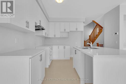 144 Cole Terrace, Woodstock, ON - Indoor Photo Showing Kitchen With Double Sink