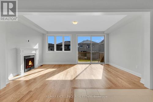 144 Cole Terrace, Woodstock, ON - Indoor Photo Showing Other Room With Fireplace