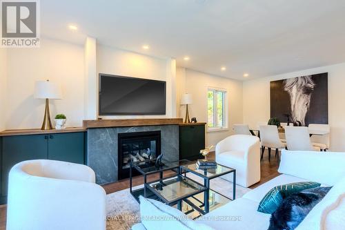 319 East 16Th Street, Hamilton, ON - Indoor Photo Showing Living Room With Fireplace