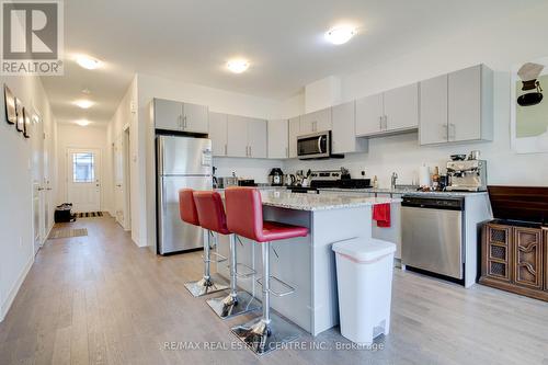 84 Cheryl Avenue, North Perth, ON - Indoor Photo Showing Kitchen With Stainless Steel Kitchen