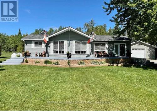 42 Cedar Bay Road, Kawartha Lakes, ON - Outdoor With Facade