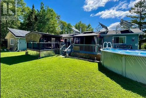 42 Cedar Bay Road, Kawartha Lakes, ON - Outdoor With Above Ground Pool