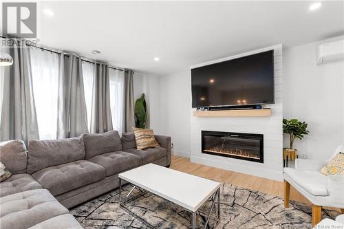 27 Luxor Drive, Riverview, NB - Indoor Photo Showing Living Room With Fireplace