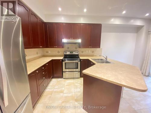 704 Courtney Valley Road, Mississauga, ON - Indoor Photo Showing Kitchen With Stainless Steel Kitchen With Double Sink