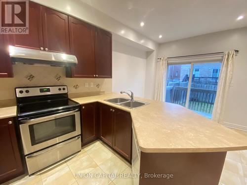 704 Courtney Valley Road, Mississauga, ON - Indoor Photo Showing Kitchen With Stainless Steel Kitchen With Double Sink