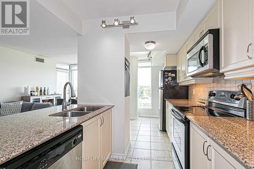 Ph311 - 18 Valley Woods Road, Toronto, ON - Indoor Photo Showing Kitchen With Double Sink