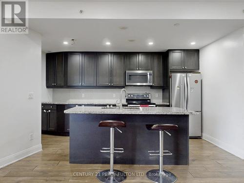 315 - 2900 Highway 7 Road, Vaughan, ON - Indoor Photo Showing Kitchen With Stainless Steel Kitchen With Upgraded Kitchen