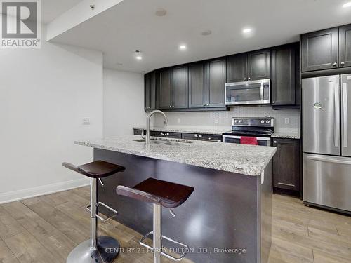 315 - 2900 Highway 7 Road, Vaughan, ON - Indoor Photo Showing Kitchen With Stainless Steel Kitchen With Upgraded Kitchen