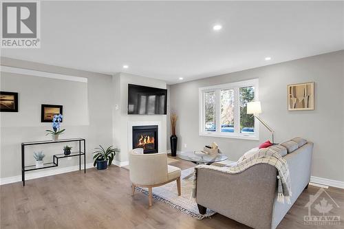 4251 Nixon Drive, Ottawa, ON - Indoor Photo Showing Living Room With Fireplace